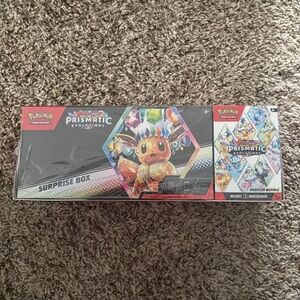 Pokemon Prismatic Evolutions Surprise Box - Red and Black